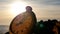 Clock left at sunset near sea shore time lapse