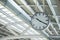 Clock at the railway station for passenger looking the time with metal structure roof in architecture background