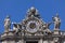 Clock on the St. Peter\'s facade in Rome, Italy