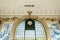 Clock of SÃ£o Bento train station. Portuguese blue tiles and ornate ceiling. Porto