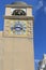 Clock tower in center of Capri island in clear day - Naples