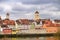 Clock tower and colorful old buildings in Regensburg