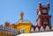 The clock tower and the curtain walls of Pena Palace. Sintra.