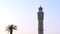 Clock tower and flying birds at Konak square city center of Izmir.