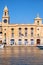 The clock tower of Malta Maritime Museum.