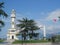 Clock tower and national flag of Georgia on the seafront in Batumi, Black Sea beach