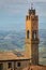 Clock tower of Palazzo dei Priori in Montalcino, Val d`Orcia, Tu