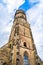 Clock tower of Stiftskirche church in Stuttgart, Germany