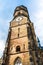 Clock tower of Stiftskirche church in Stuttgart, Germany