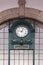 Clock on the wall at Sao Bento train station in Porto