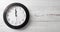 Clock on a white background. A minute to twelve. Banner. Place for your text