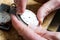 Clockmaker fixing a turnip pocket watch detail