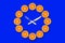 Clocks made of half cut tangerines with arrows made of fork and knife that shows 10 minutes past 10 on a bright blue background.