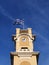 Clocktower Flying Greek Flag