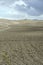 Clods of ploughed hills in Tuscan countryside, near Biancacamicia, Siena, Italy