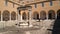 Cloister with fountain and well