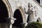 Cloister monastery pedralbes,detail angel statue and arch.Barcelona.