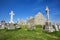 Clonmacnoise Cathedral with the typical crosses and graves