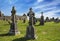 Clonmacnoise Cathedral with the typical crosses and graves