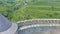 Close aerial shot of tower spire and fortification wall of medieval castle