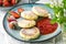 Close cheese pancakes, syrniki, curd fritters with fresh strawberries on plate background