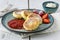 Close cheese pancakes, syrniki, curd fritters with fresh strawberries on plate background