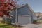 Close double timber clad garage for cars