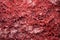 close focus on the rough texture of red coral stone