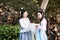 Close girlfriends bestie in Chinese traditional ancient costume chat talk laugh