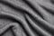 close image of a gray twill fabric
