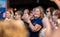 Close of lady singing and clapping to music passionately outside a bar in garachico, Tenerife, Spain