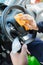 Close Of Man Cleaning Interior Of Car