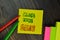 Close More Sales write on sticky note isolated on Wooden Table. Business concept