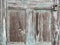 Close old weathered barn shed house locked wooded peeling paint door architectural background