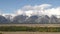 close pan of the teton range with fresh autumn snow at jackson