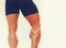 Close portrait of bodybuilder legs