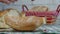 Close Shoot With a Man Arranging Fresh Bread in a Bread Basket