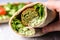 close shot of falafel inside a pita pocket