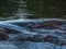 Close of shot of river water rippling and flowing