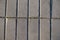 Close shot of stack bond brick-like gray concrete pavement