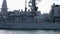 Close tracking clip of HMS Westminster whilst docked in Portsmouth Harbour