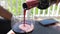 Close up 4k footage of red wine being poured