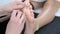 Close-up 4K video of woman enjoying thai foot massage in professional salon