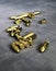 Close up of 9 mm golden pistol bullets ammo on background