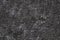 Close-up abstract background in gray and black from decorative concrete. Lunar landscape