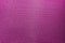 Close-up abstract flat purple high detail textured clothing fabric pattern background partial focus and realistic light