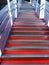 Close-up of abstract metal staircase with backlight with blur / side effect.