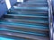 Close-up of abstract metal staircase with backlight with blur / side effect.