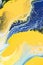 close up of abstract texture with yellow and blue acrylic paint