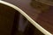 Close up acoustic guitar curves